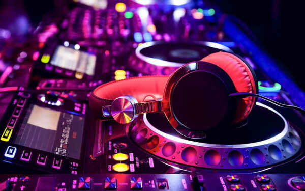 DJ working with sound equipment